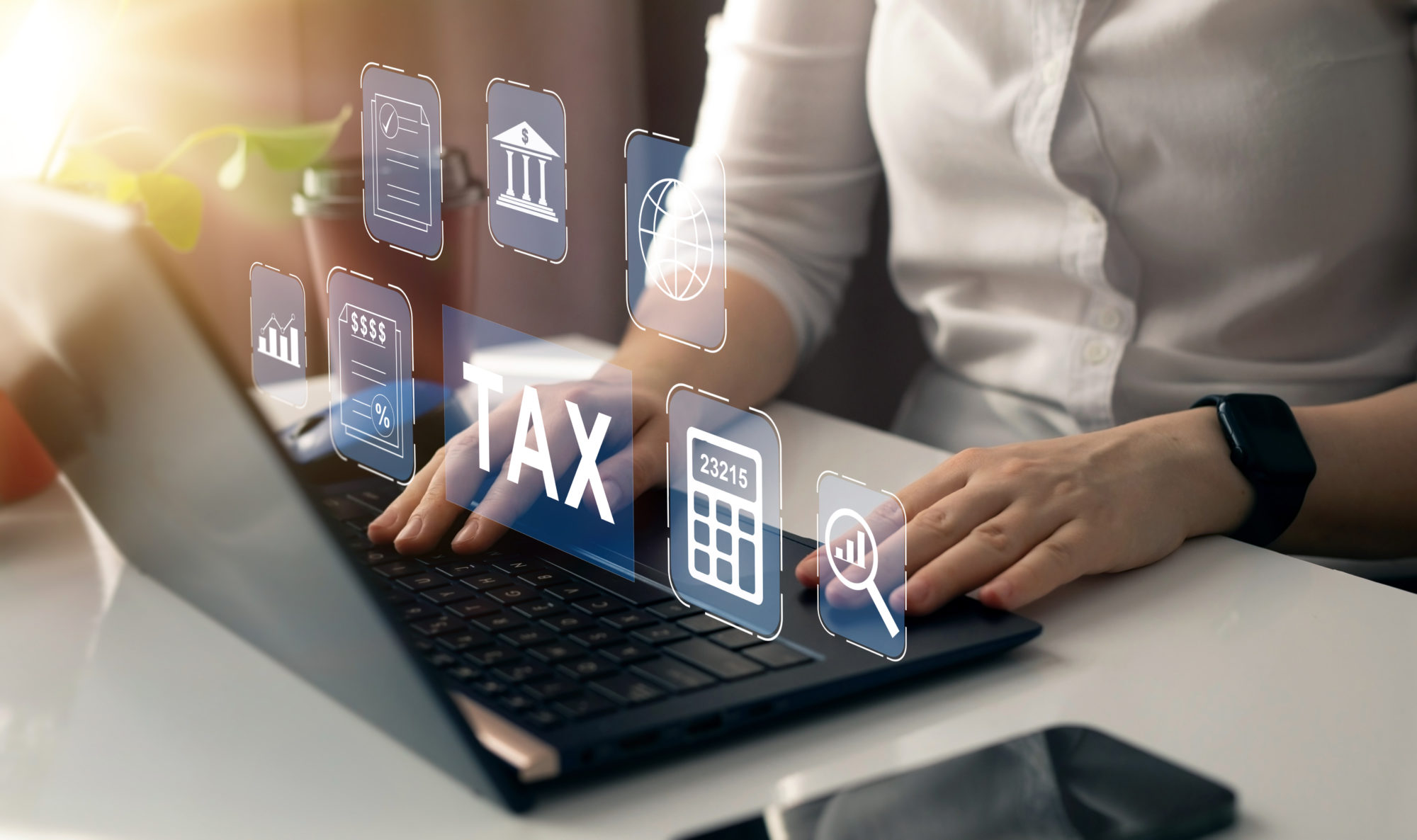 Financial research,government taxes and calculation tax return concept. Businessman using the laptop to fill in the income tax online return form for payment.